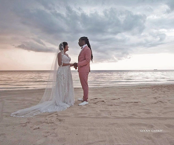 A couple getting married on the beach in Jamaica
